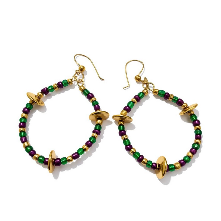 Hoop earrings with green, purple, and gold beads on a white background