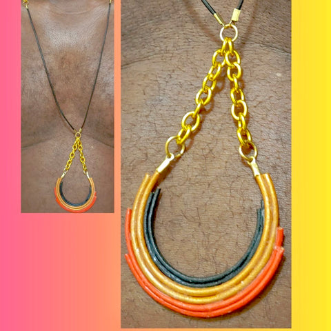 Leather cord gold, black, and orange necklace with gold tone chain